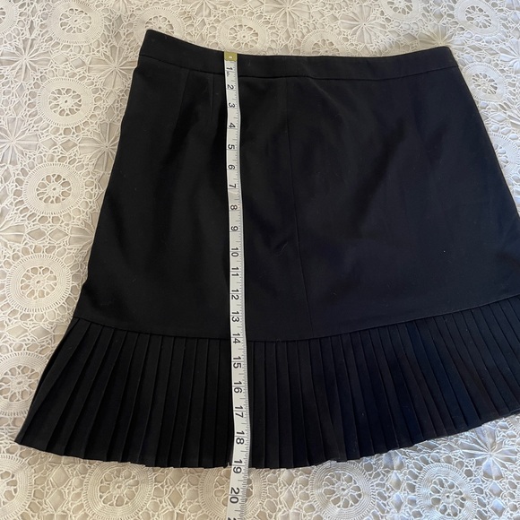 The limited black pleaded asymmetrical miniskirt - Picture 6 of 7